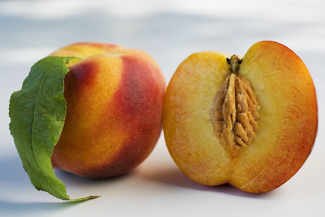 Whole Peach with Half a Peach