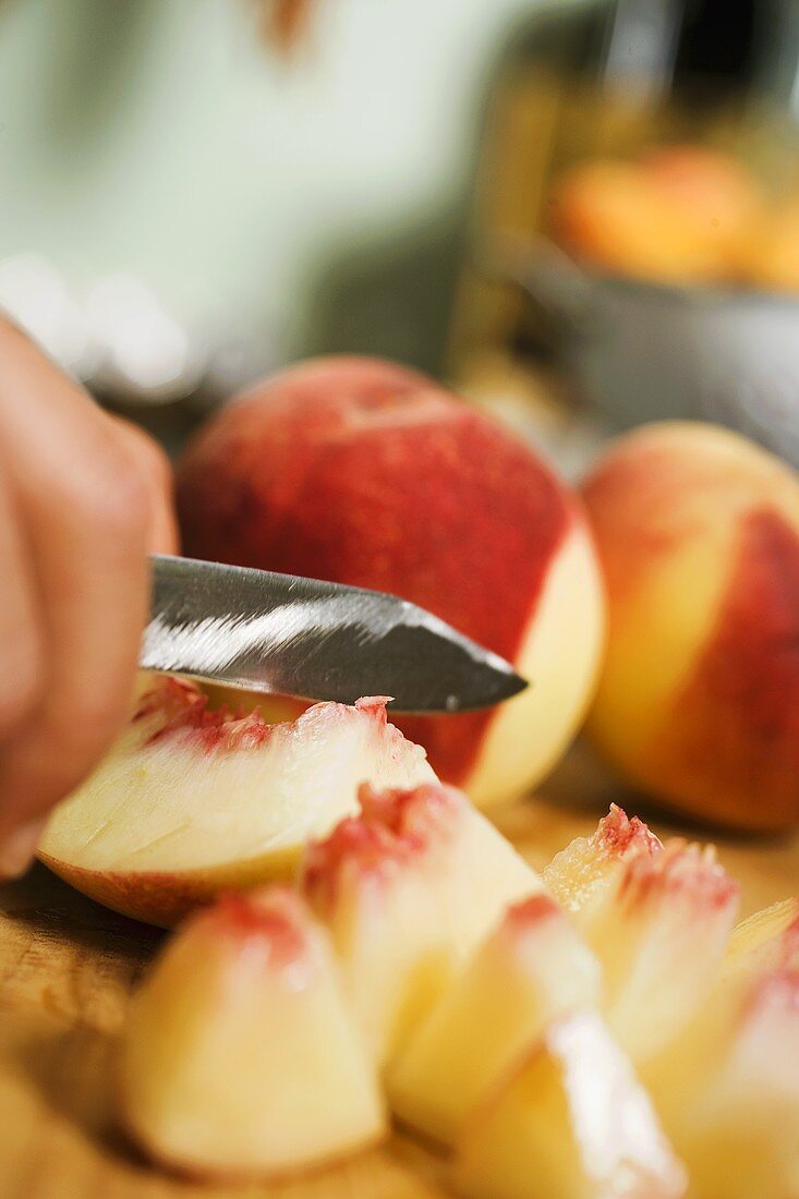 Cutting up peaches