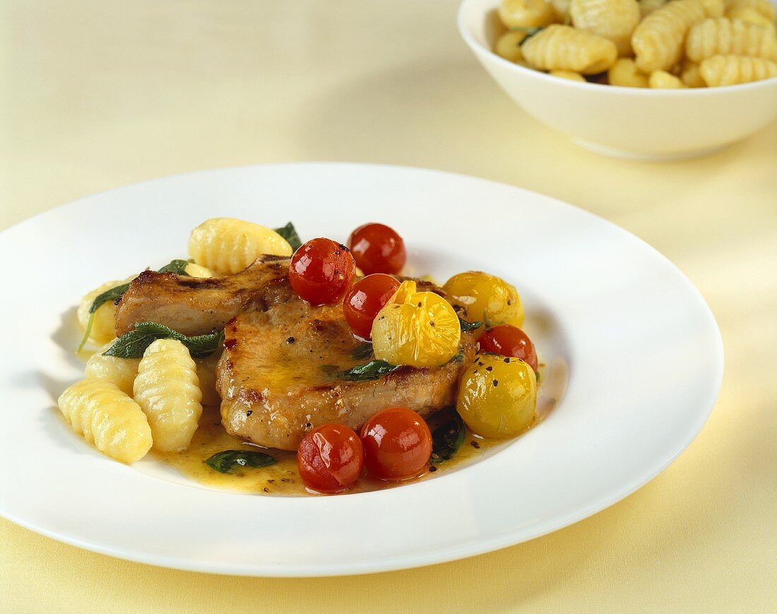Veal cutlet with cherry tomatoes and gnocchi