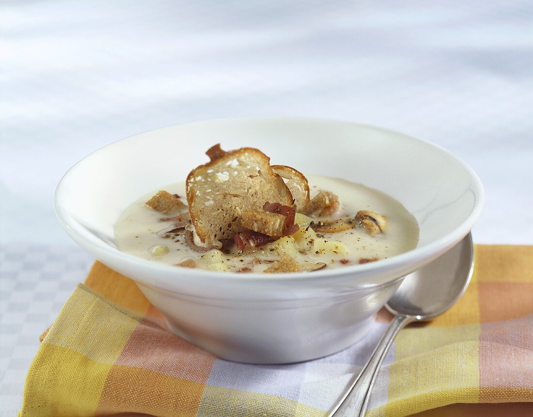 Potato soup with bacon, mushrooms and bread (Austria)