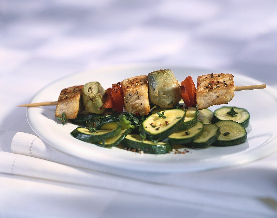 Turkey and artichoke kebab with courgettes