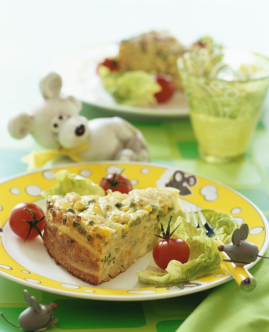 Pasta cake with peas and sweetcorn for children