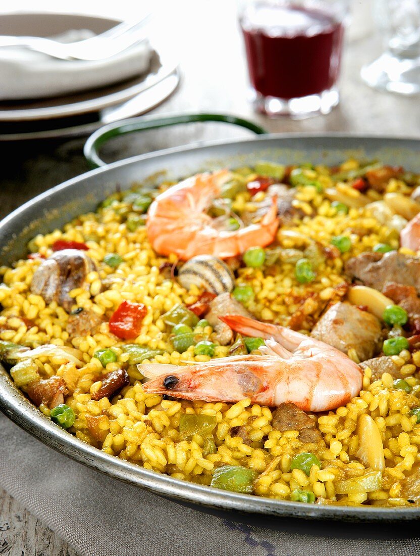 Paella with seafood in pan