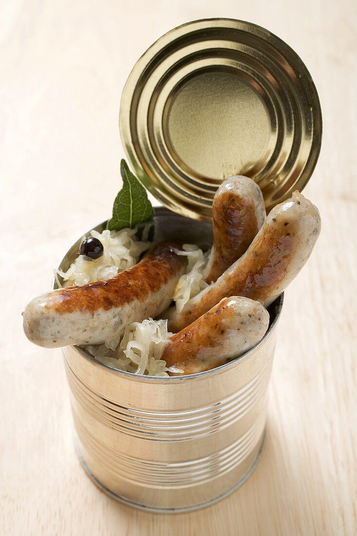 Sausages and sauerkraut in tin