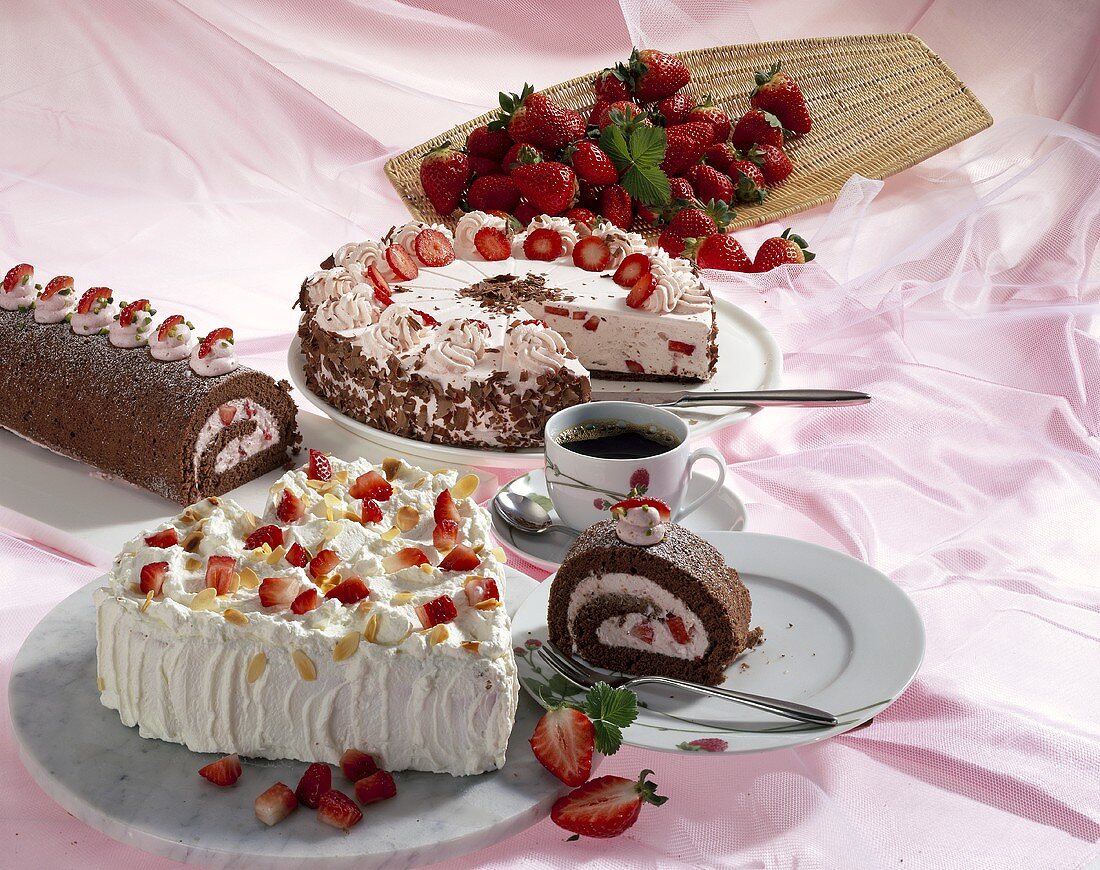 Strawberry gateaux and chocolate roll with strawberries