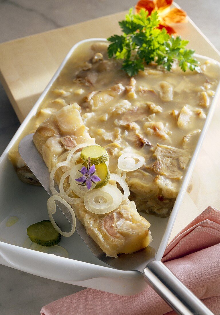 Knöcherlsulz (jellied pork dish) with onions & gherkins (Bavaria)