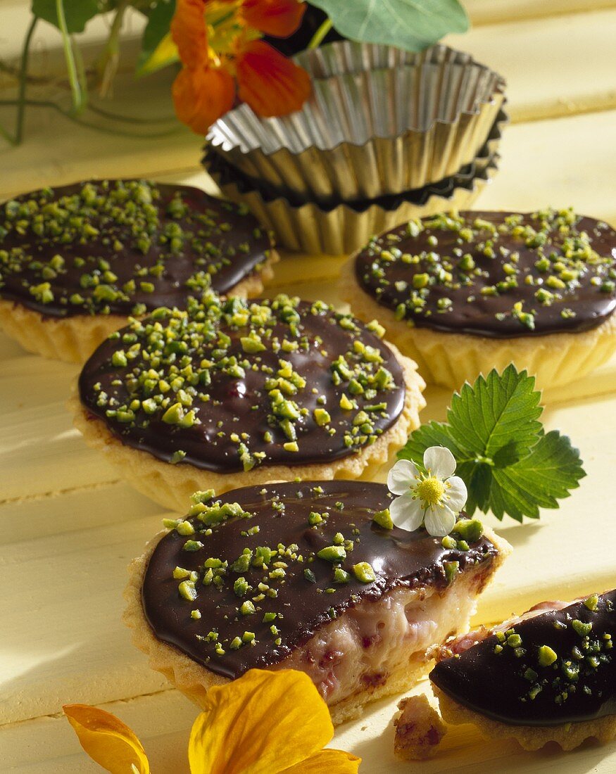 Marzipan strawberry tarts with chocolate icing