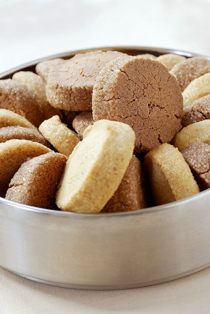 Cocoa and vanilla biscuits in biscuit tin