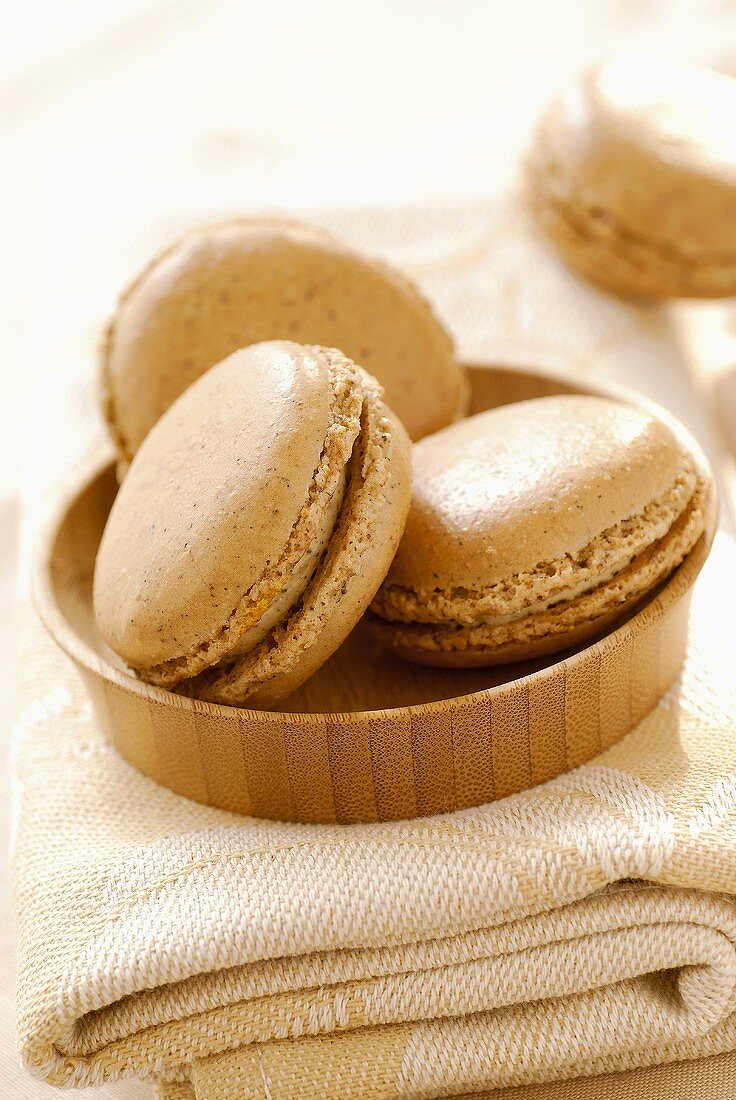 Mocha macaroons filled with vanilla cream