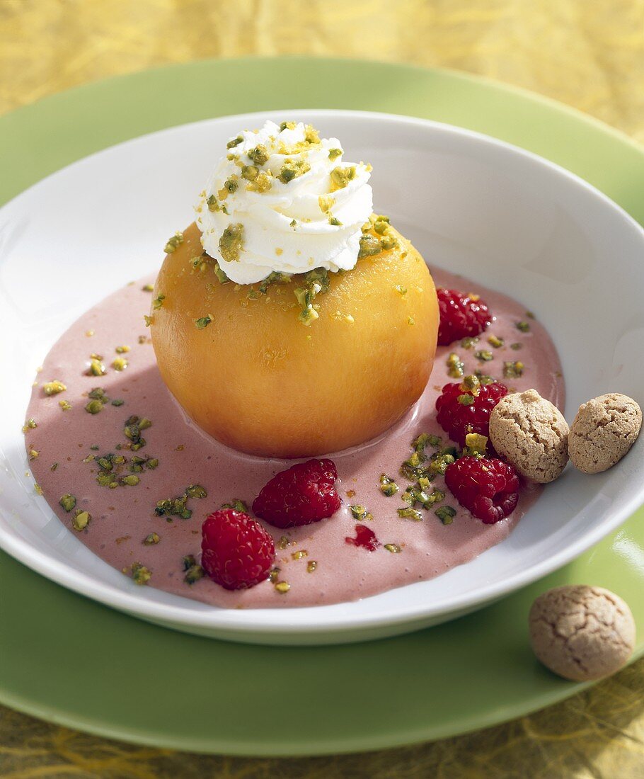 Poached peach with cold raspberry sabayon