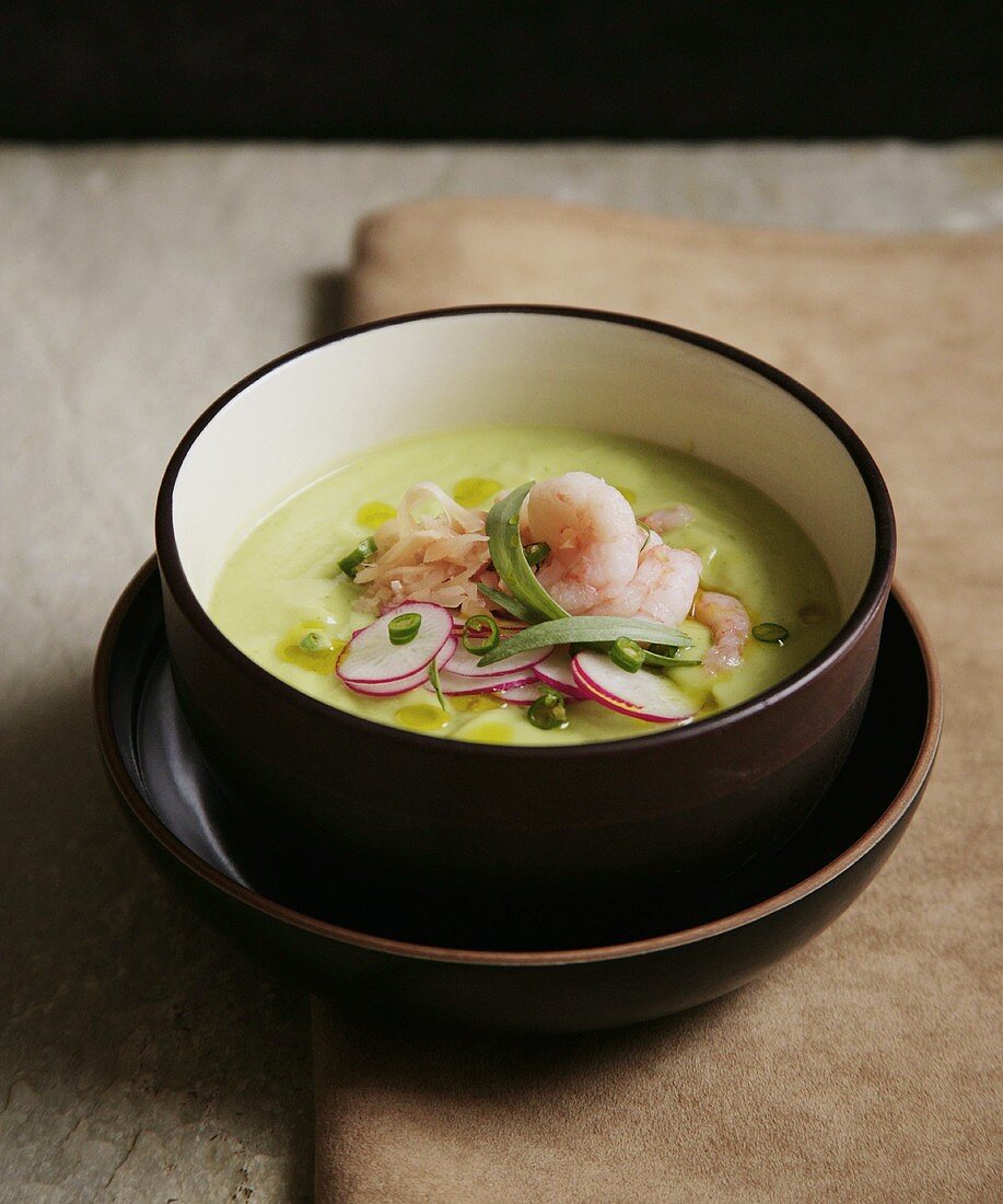 Cucumber soup with shrimps and radishes