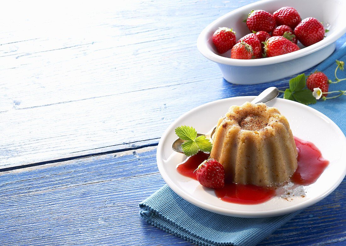 Halvas (Greek semolina pudding) with strawberry sauce