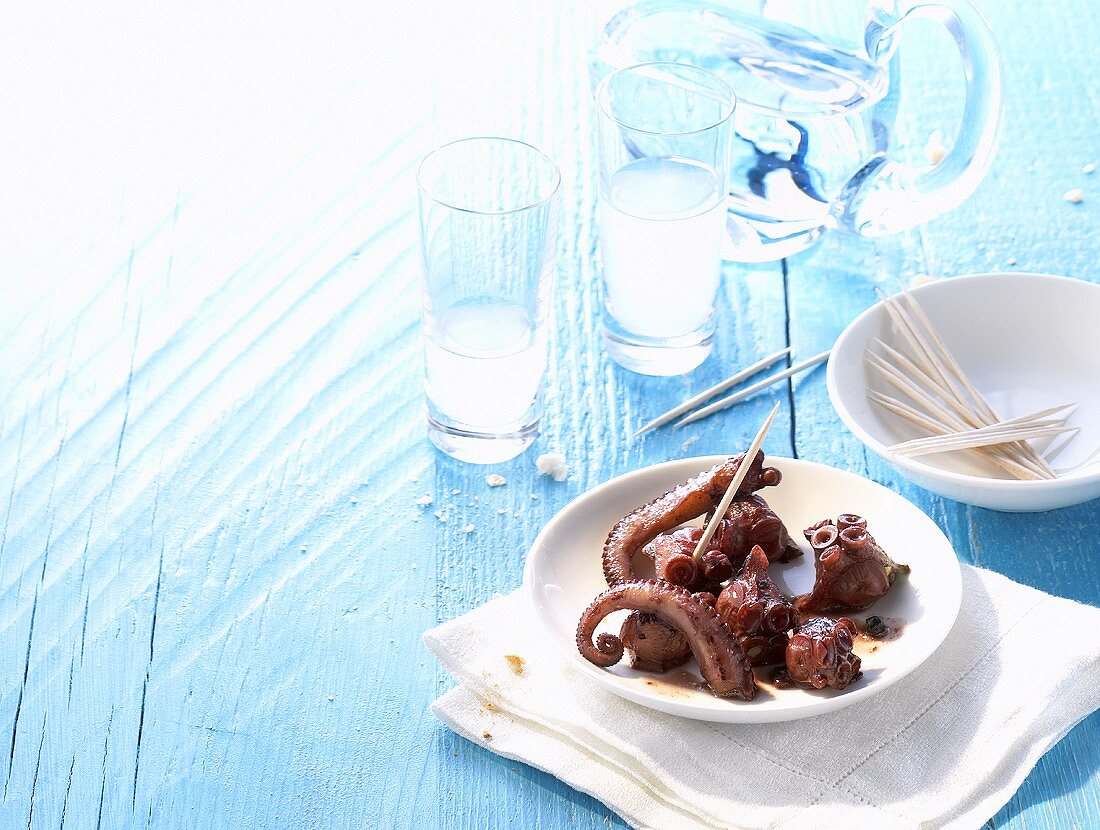Octopus marinated in red wine, ouzo (Greece)