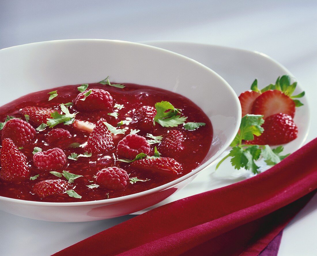 Berry soup with coriander leaves