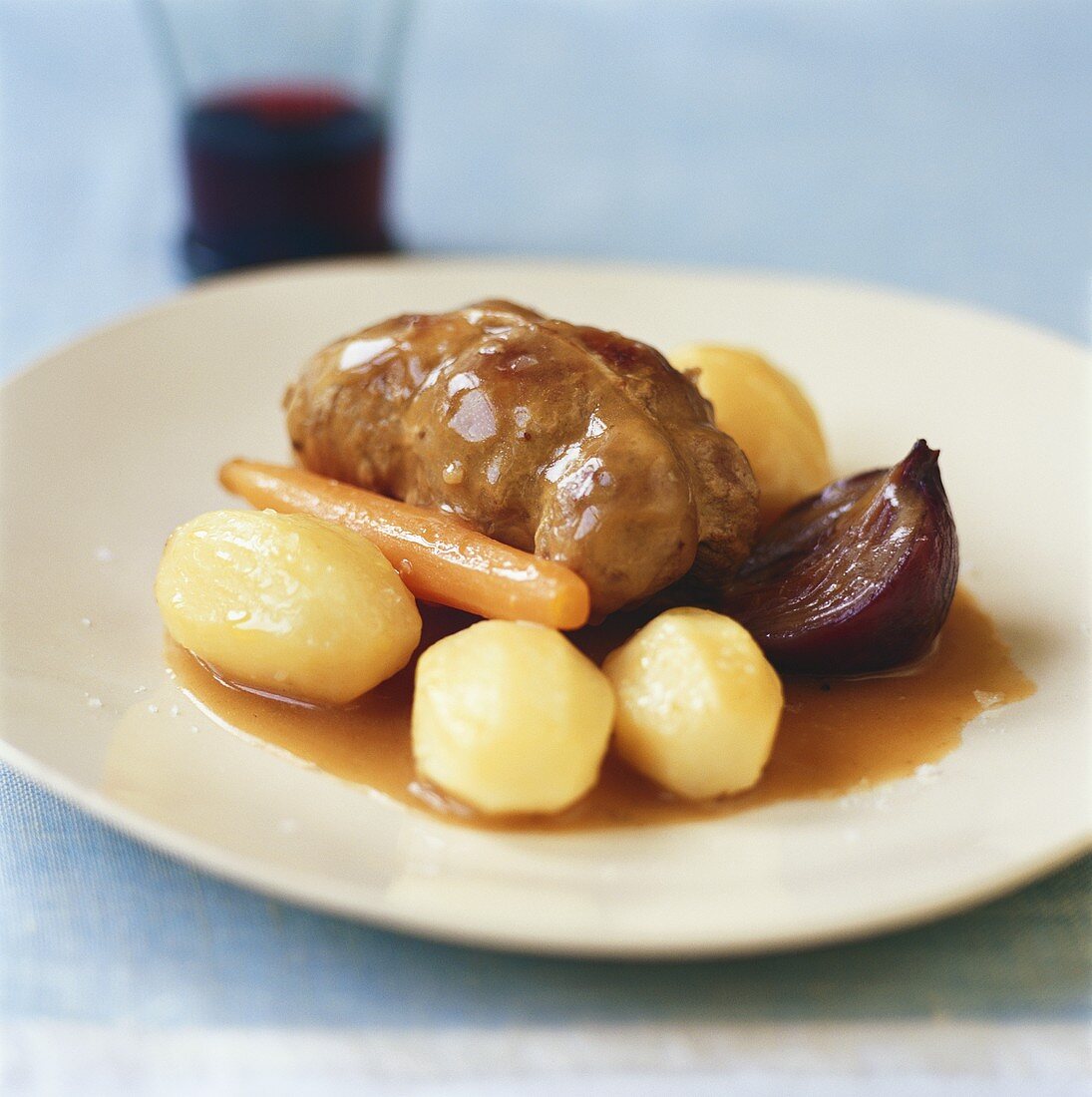 Veal roulades in white wine sauce with potatoes & carrots