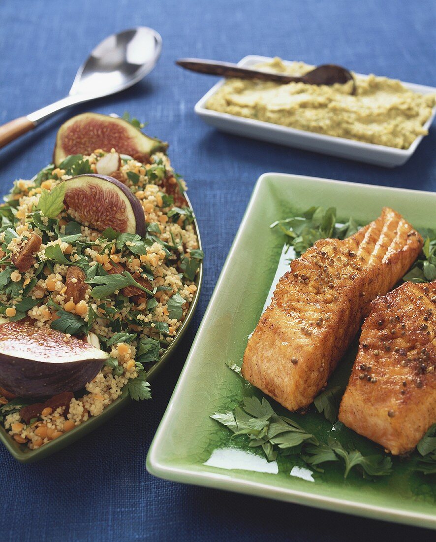 Salmon with paprika, couscous with lentils & figs, hummus