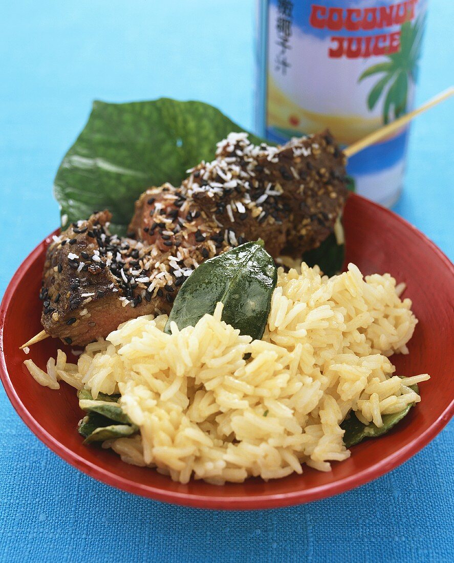 Skewered beef with coconut rice and lemon leaves (Asia)