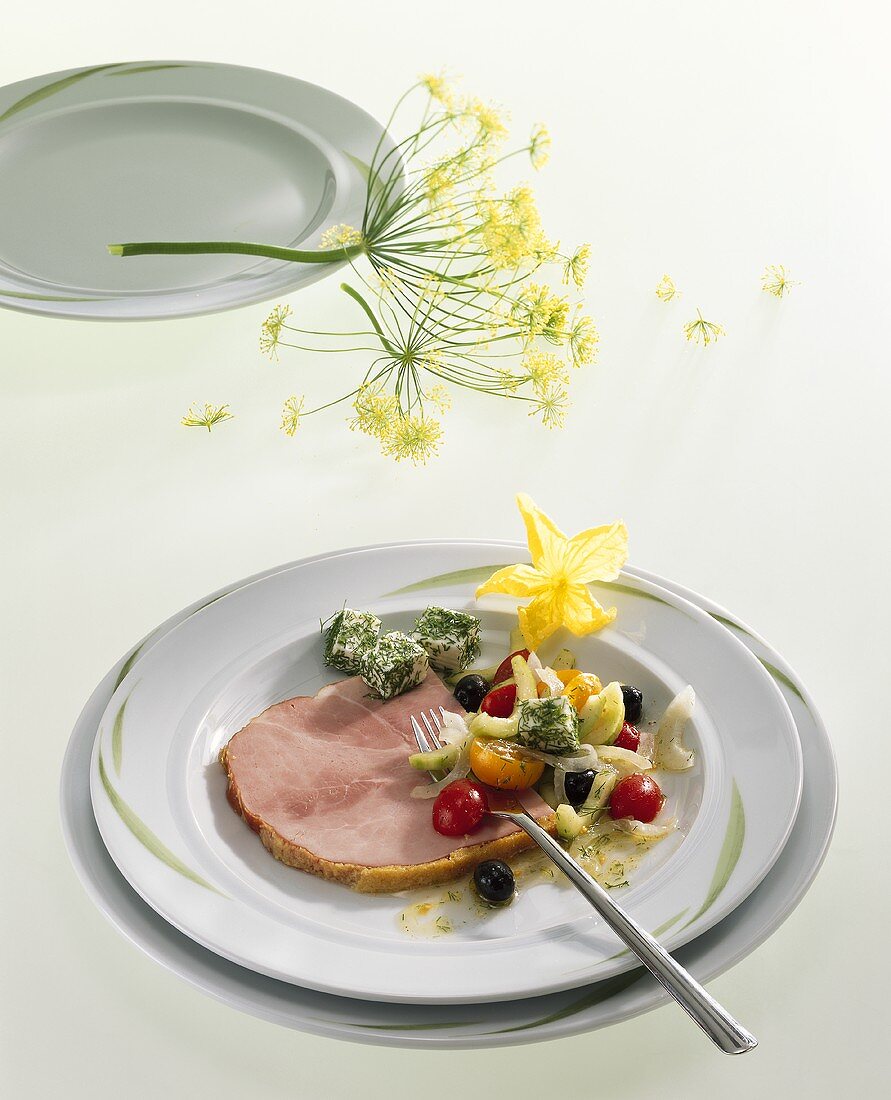 Ham with mustard and honey crust and salad garnish