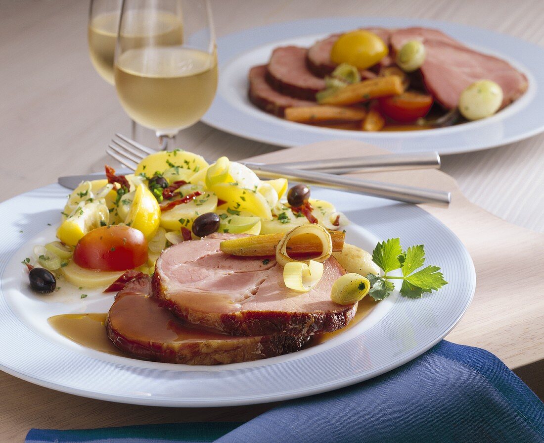 Surbraten (corned pork) with colourful potato salad
