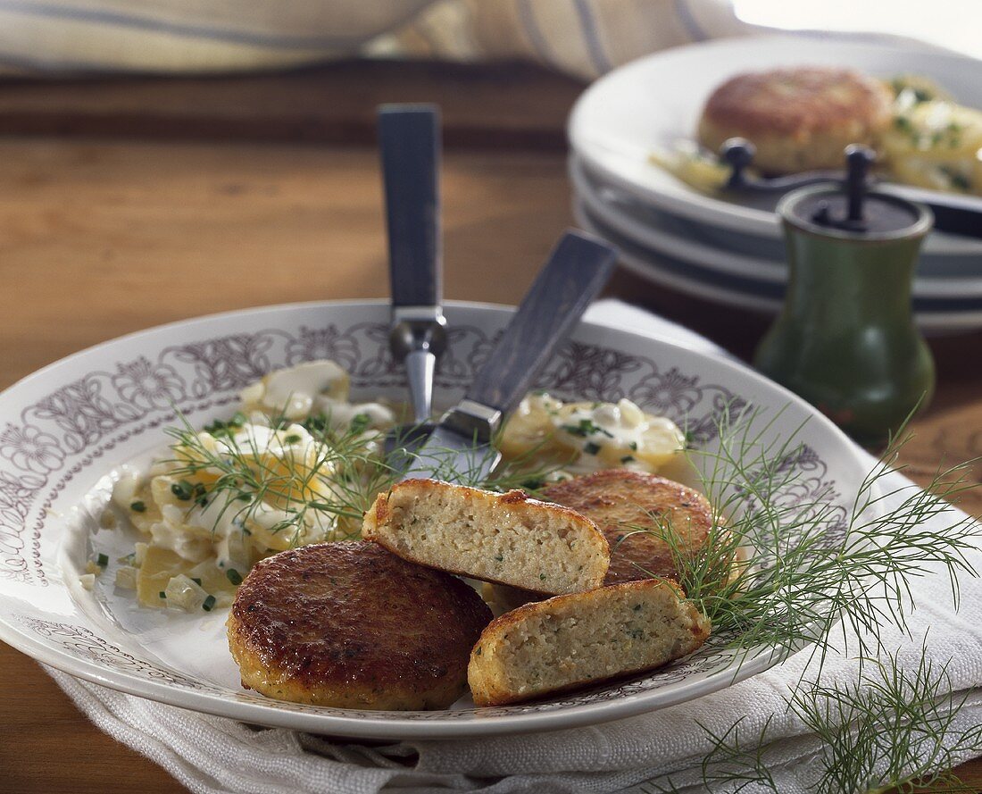 Fish cakes with potato salad and dill