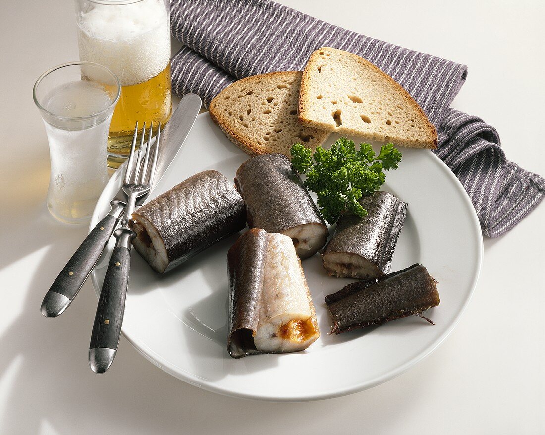 Smoked eel with bread, beer and schnapps