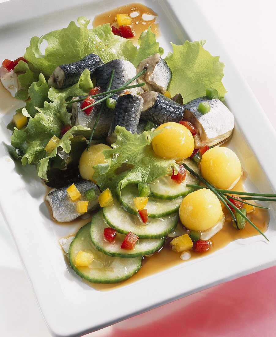 Salad with Bismarck herring, cucumber and potatoes