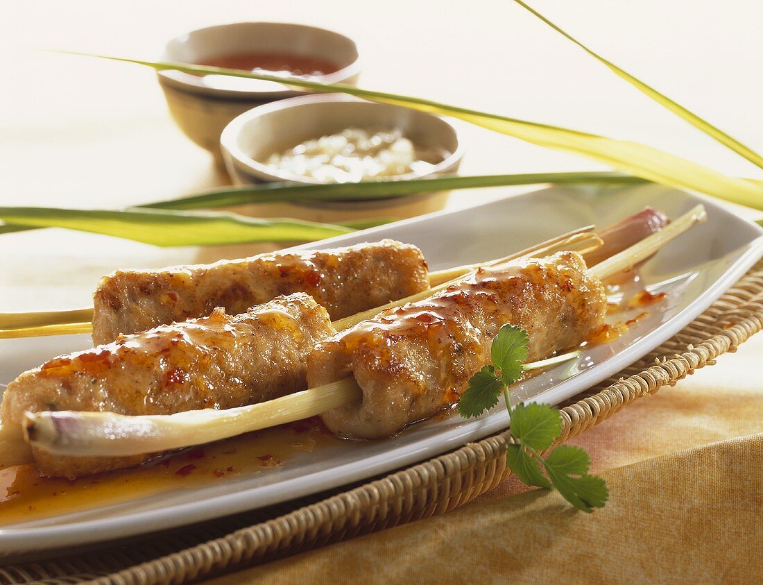 Seafood kebabs on lemon grass stalks (Asia)