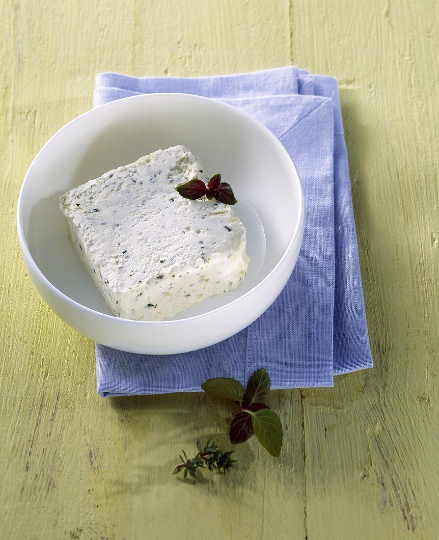 Robiola (fresh cheese from Italy) in white bowl