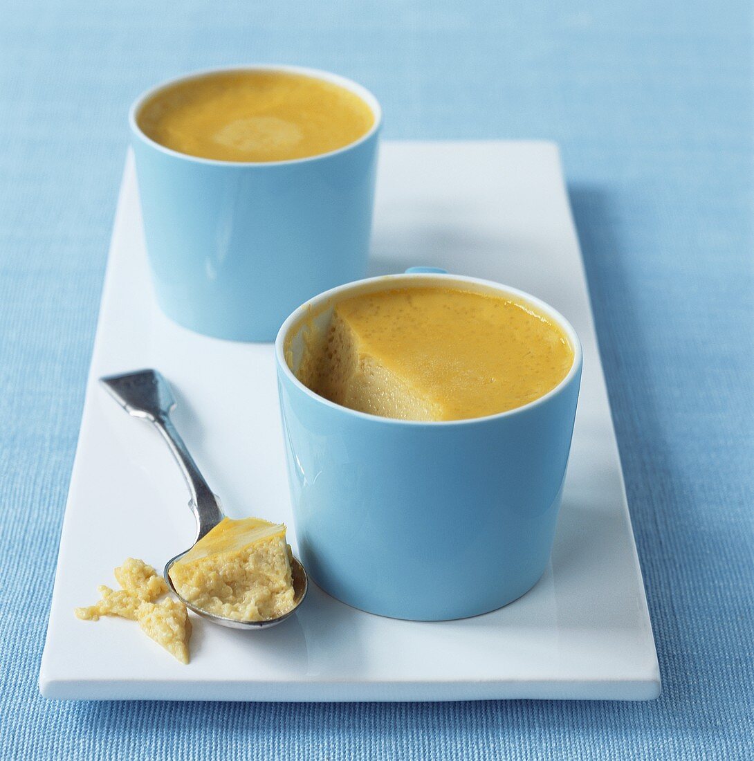 Pumpkin custard in two blue cups