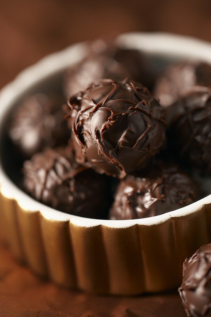 Chocolate truffles in brown dish