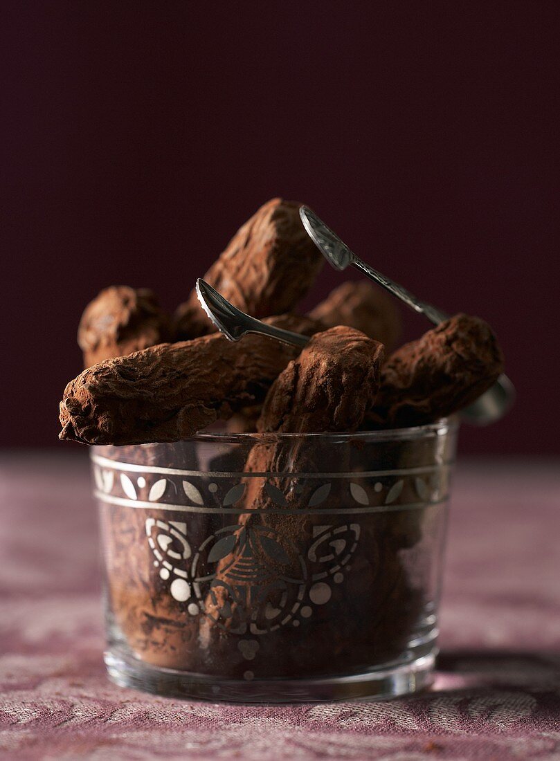 Chocolate truffle sticks with cocoa powder