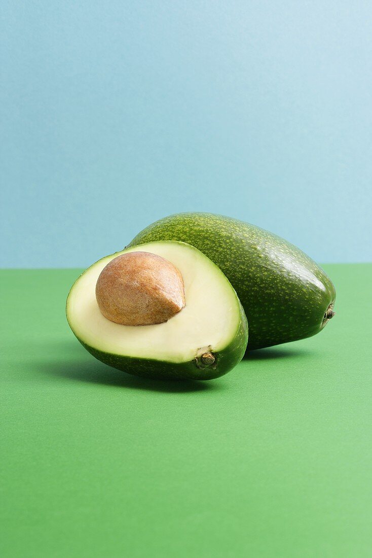 Whole avocado and half an avocado