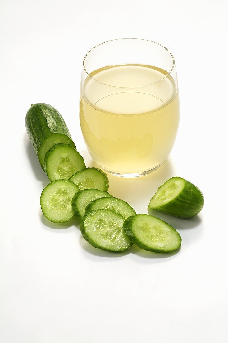 Fresh cucumber and glass of cucumber juice