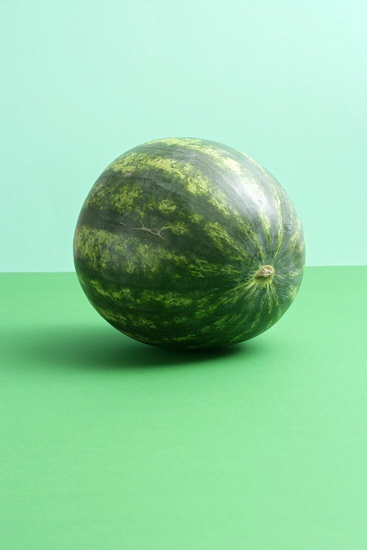 Watermelon on green background