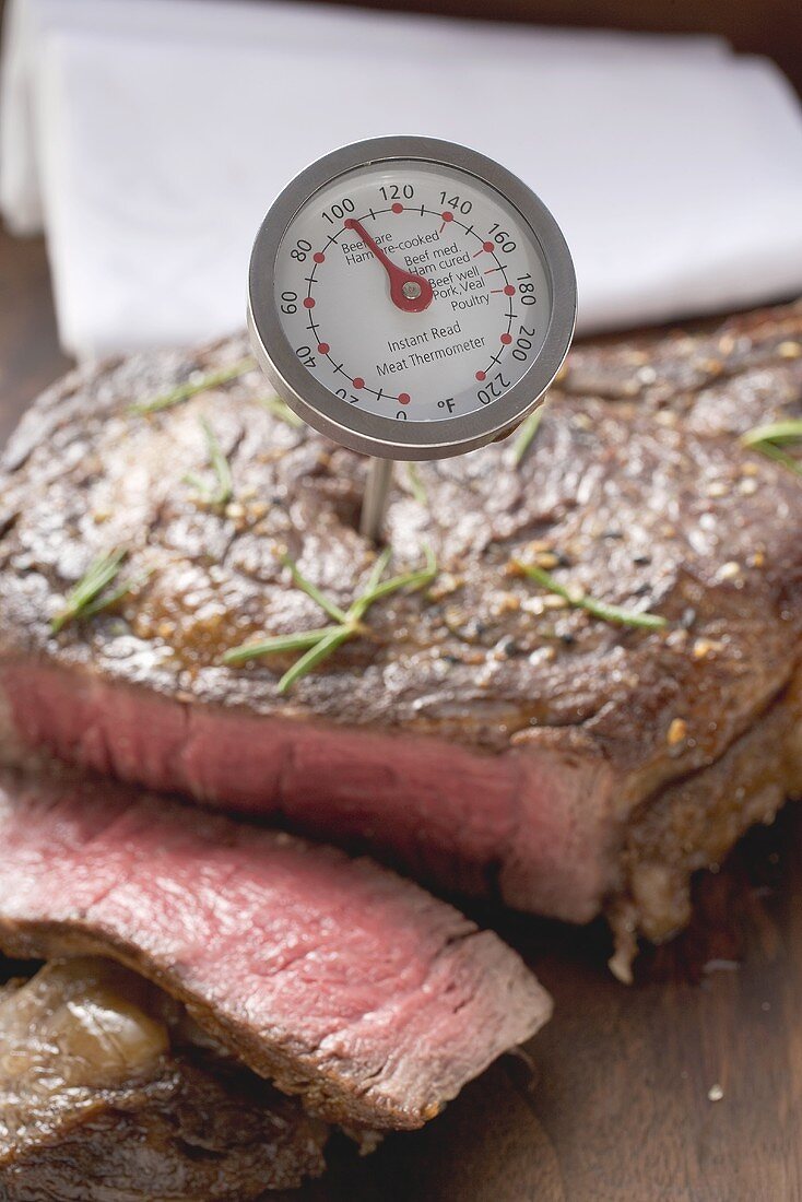 Sirloin steak with meat thermometer