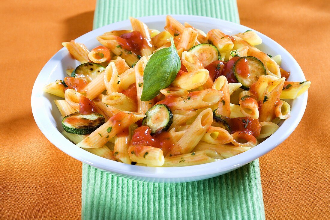 Penne with tomato sauce and courgettes