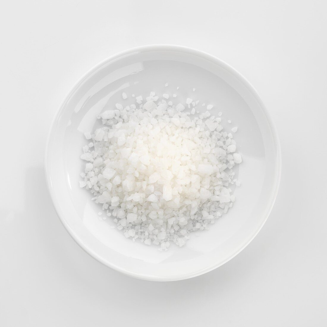 Coarse salt in white dish