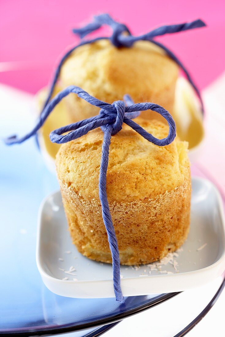 Two pineapple and coconut muffins to give as a gift