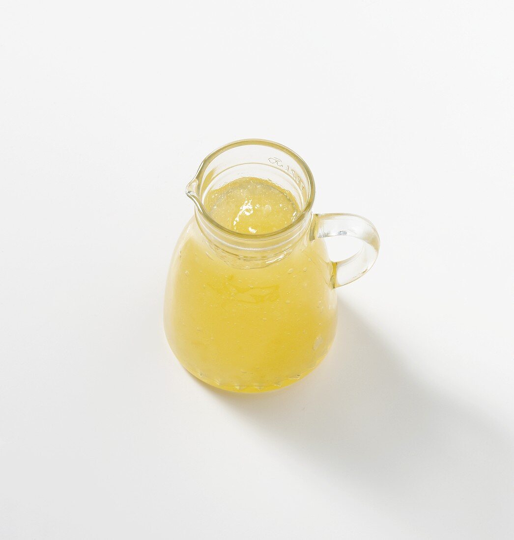 Pear syrup in glass jug
