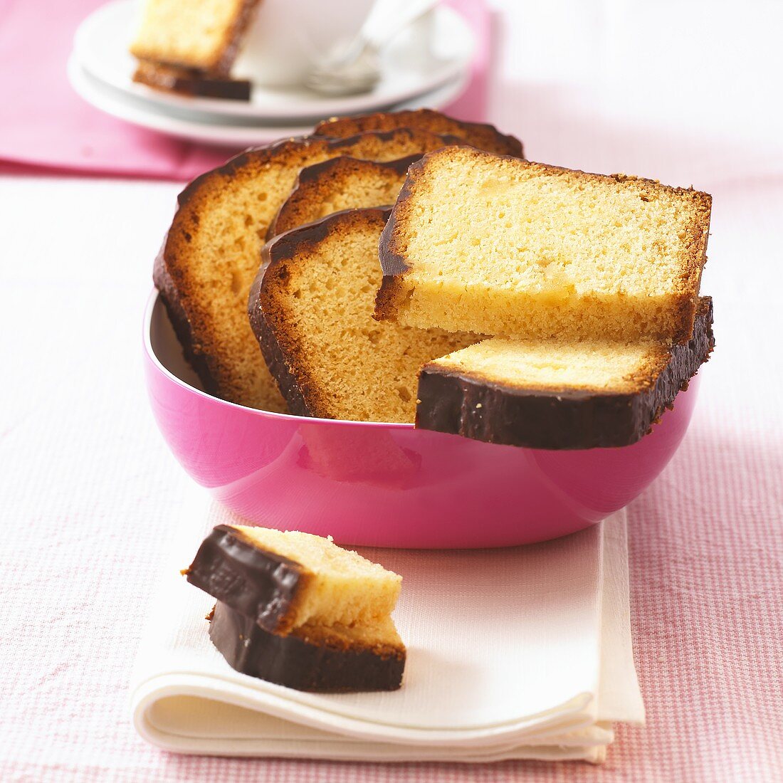 Several slices of marzipan cake with chocolate icing