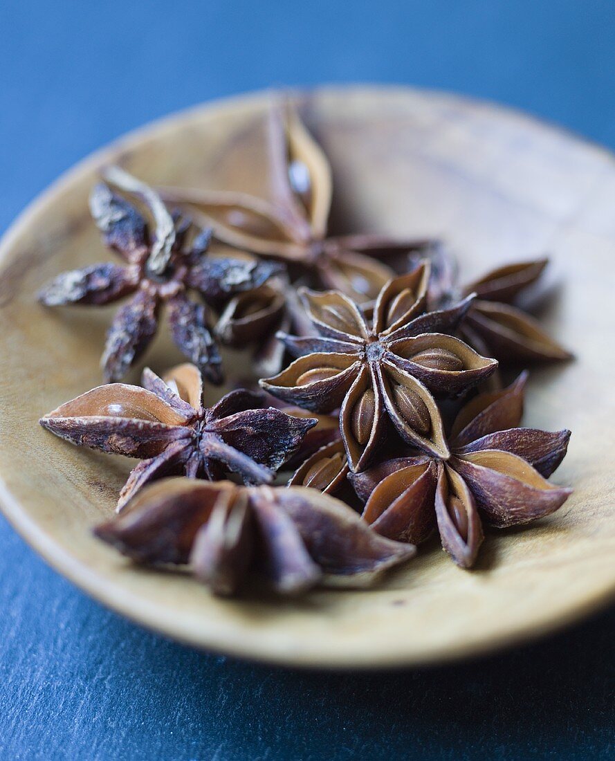 Star anise in shallow wooden dish