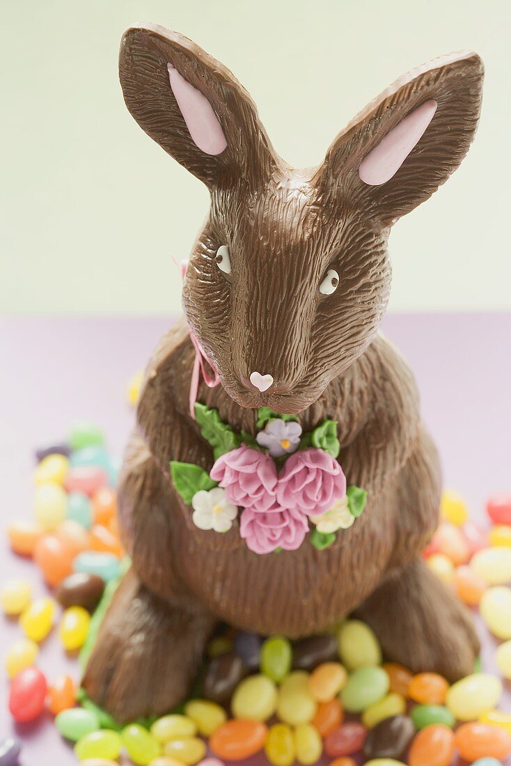 Chocolate Easter Bunny surrounded by sugar eggs