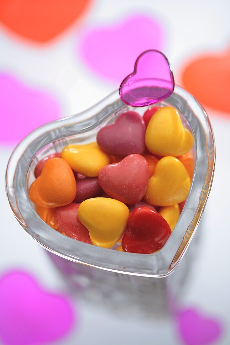 Coloured hearts in a glass dish