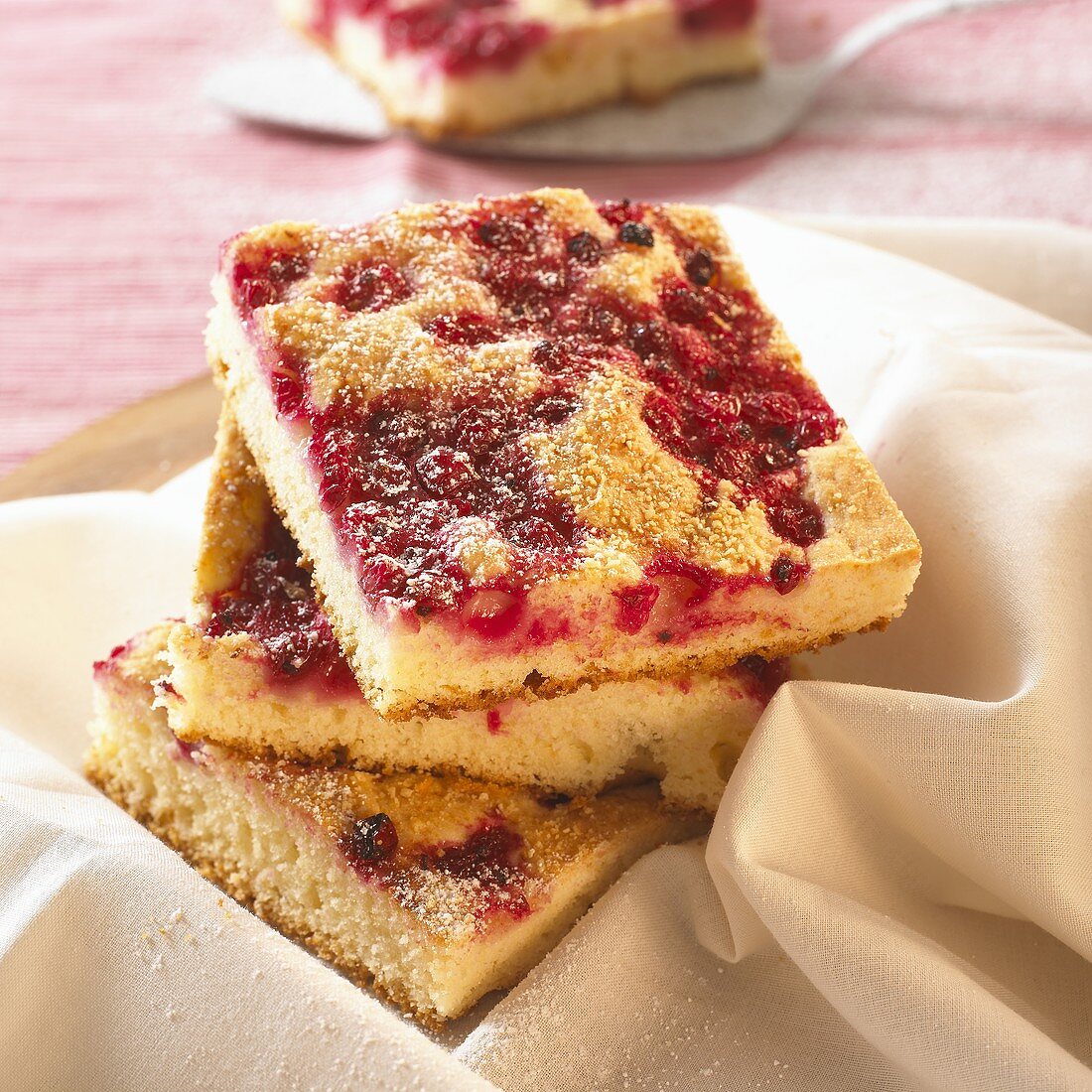 Several pieces of redcurrant cake