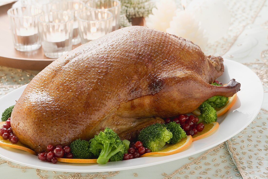 Roast duck with broccoli and cranberries for Christmas