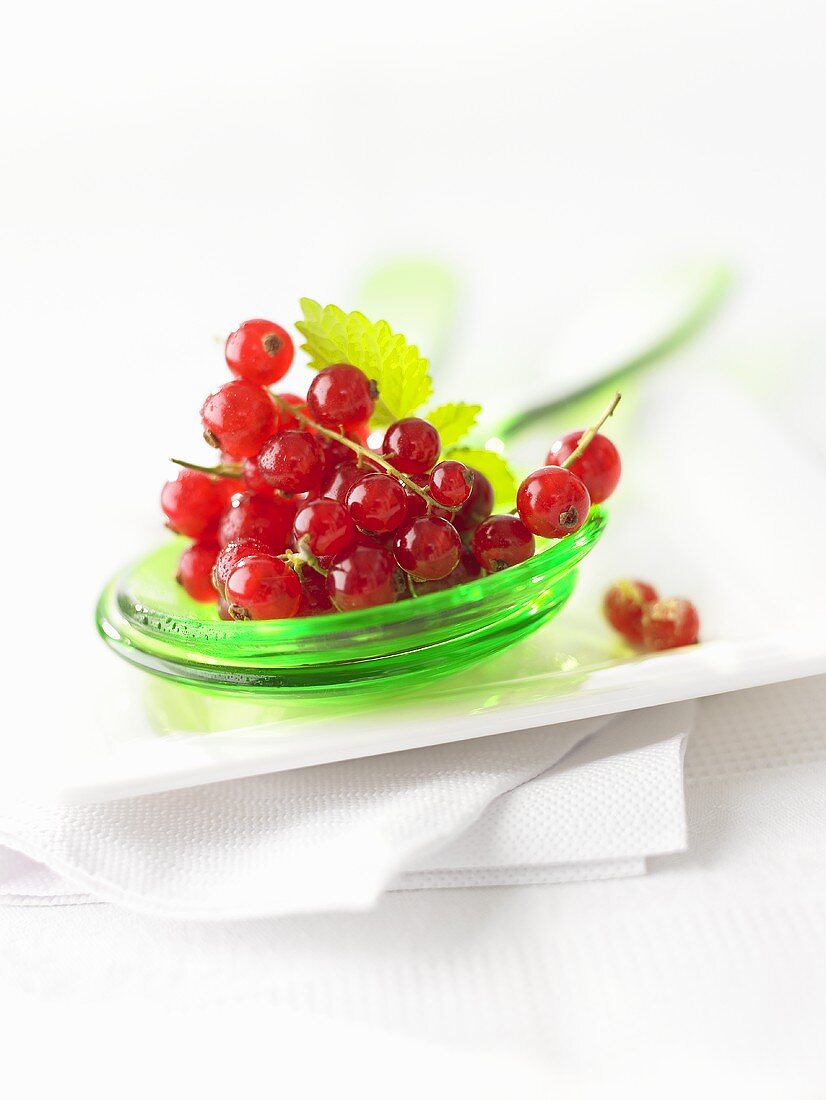 Redcurrants on salad servers