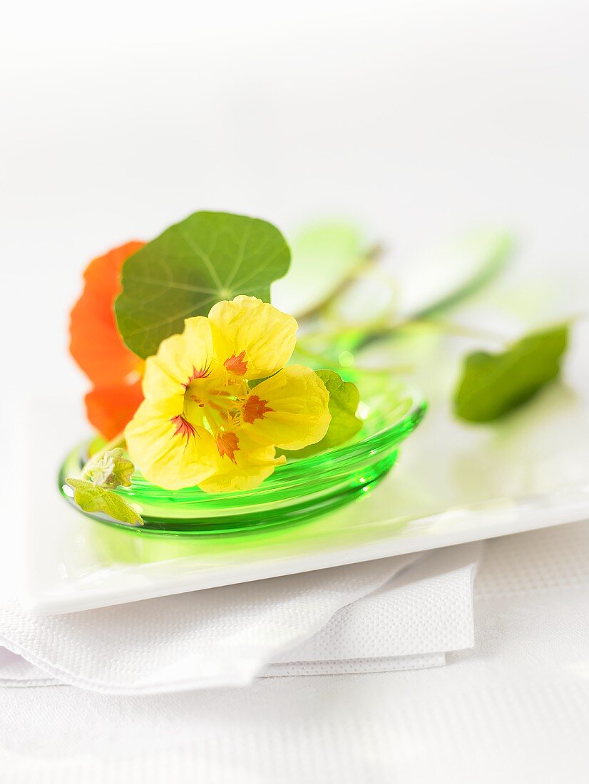 Nasturtium flowers on salad servers