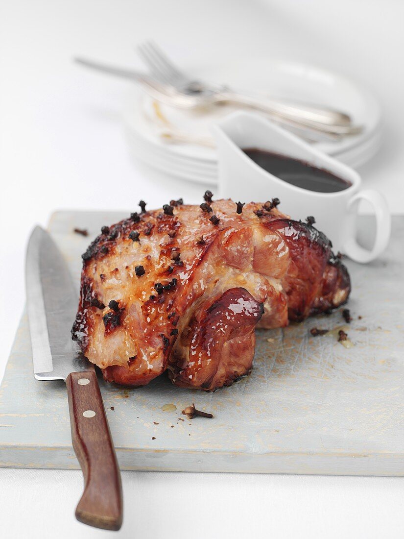 Honey-glazed roast ham with cloves