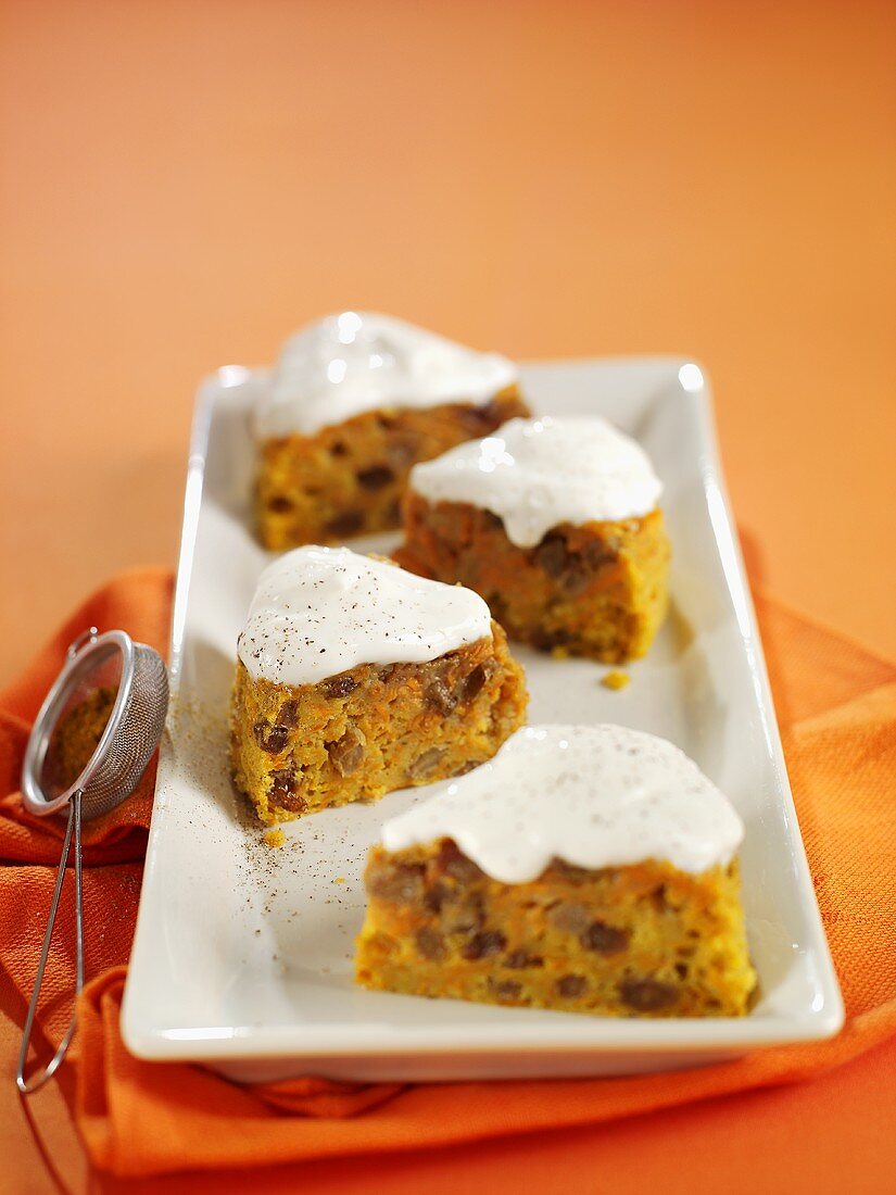 Several pieces of carrot cake