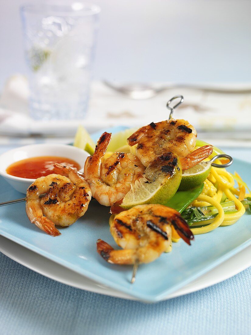 Prawn kebabs with noodles and chilli sauce